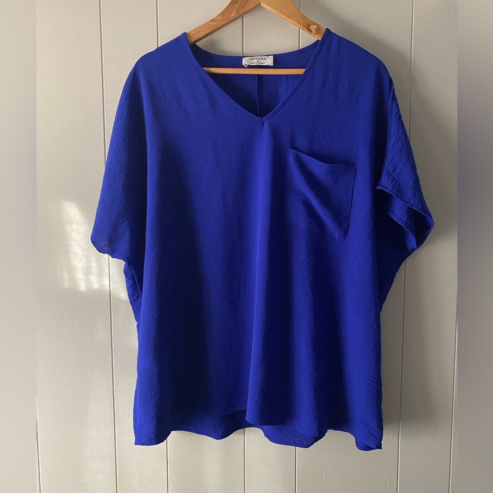 Zenana Oversized Woven Airflow V-Neck Dolman short sleeve pocket top. Size small